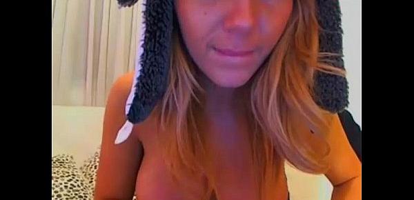  Hot blonde cam girl shows shaved pussy close up